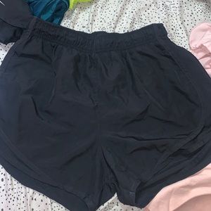 solid black nike shorts, size small